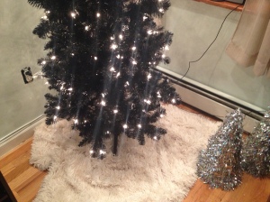 This is before the decorations were put on. You can see the faux fur throw used as a tree skirt!